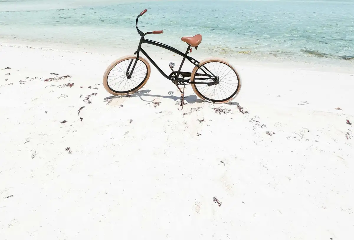 Bike on Maui white sand beach.