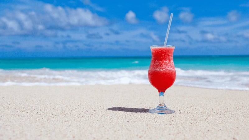 drink-on-beach-under-blue-sky