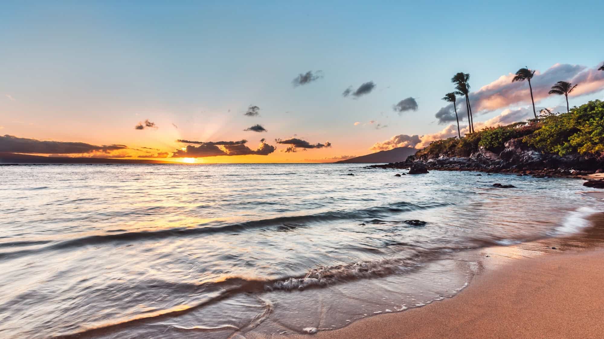 Stunning Maui sunset in Kapalua Bay Beach.
