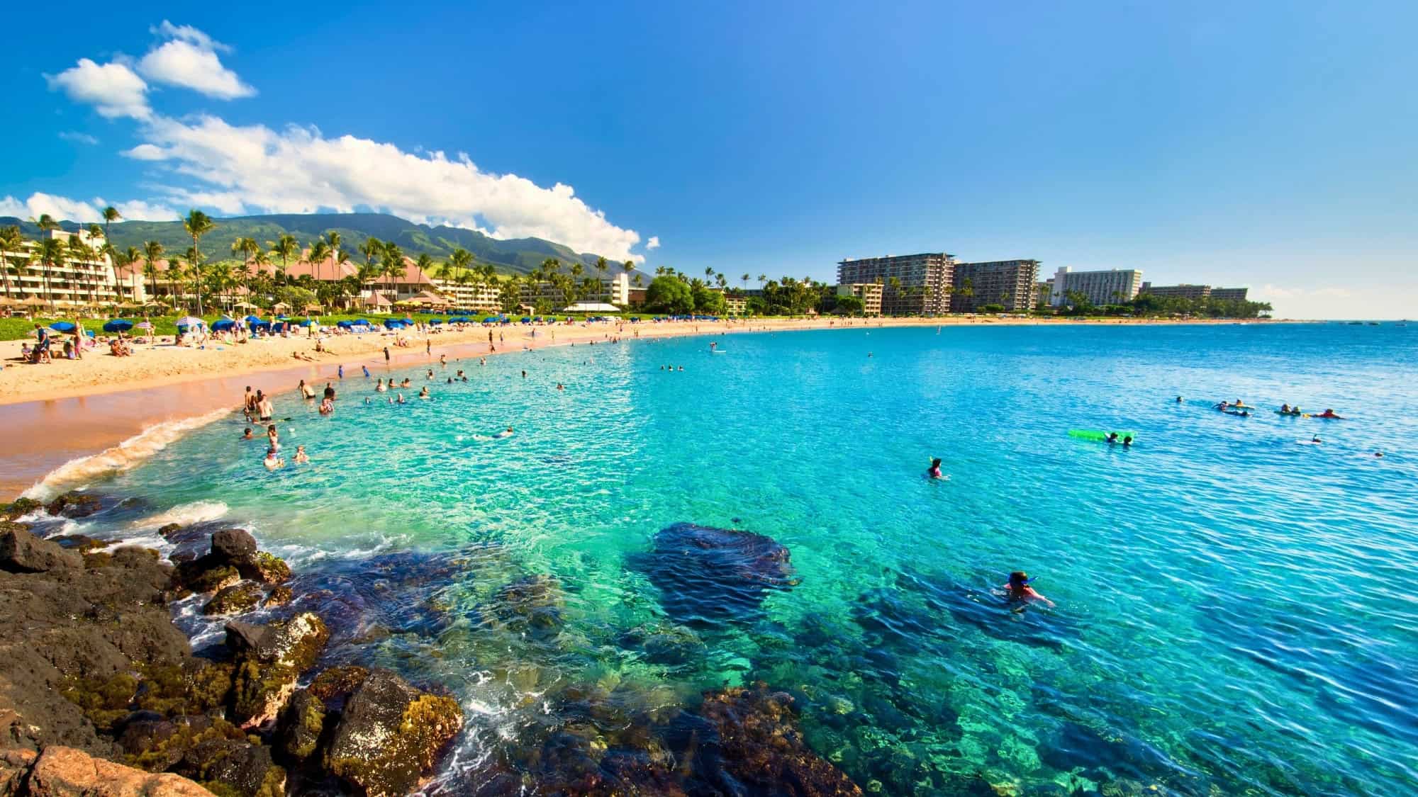 Scenic view of Black Rock Kaanapali Beach with golden sands and turquoise waters.