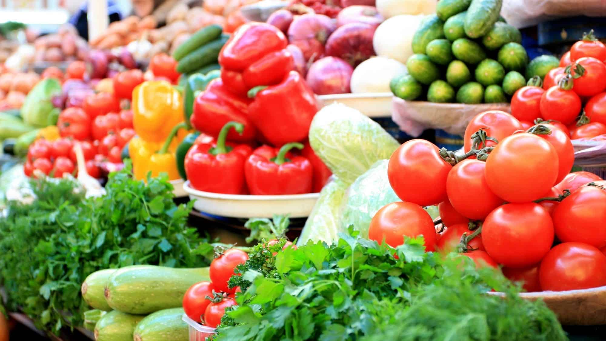 Colorful fresh vegetables at West Maui's farmers market, showcasing local produce.