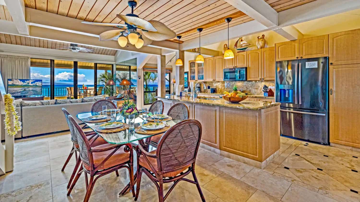 Spacious kitchen and dining area with ocean views at Kahana Village beachfront condo rental.